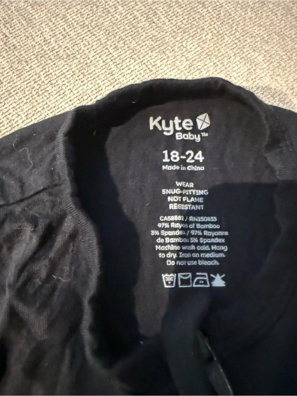 Kyte BABY Black Long-Sleeve Infant Jumpsuit with Front Zipper